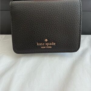 kate spade black pebbled leather card case with gold logo, new from Nordstrom